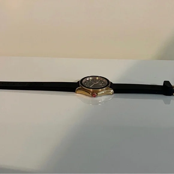 Only worn a few times. Black and rose gold with diamonds